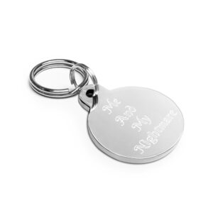 A silver key chain with a round tag.