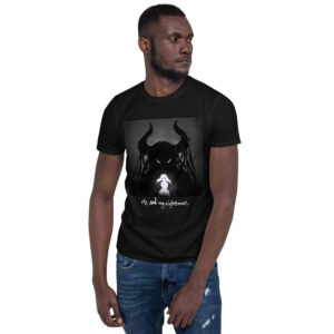 A man wearing jeans and a t-shirt with an image of a demon.