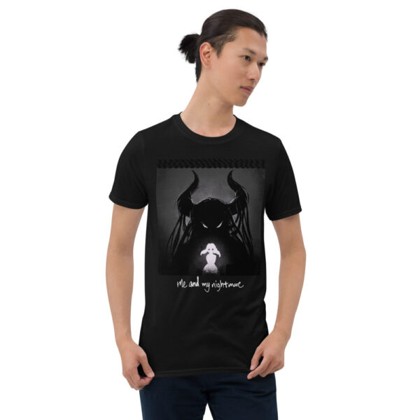 A man wearing a black t-shirt with an image of a demon.