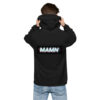 A man in black hoodie with the word mamn on it.