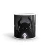 A mug with an image of a demon and a woman.